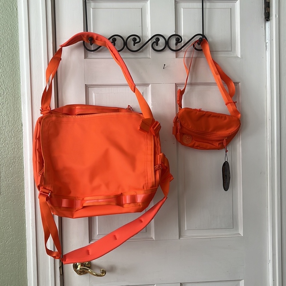 Beautiful orange carry on and Fanny back